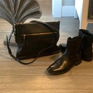 Fossil black leather purse with adjustable strap and gold hardware